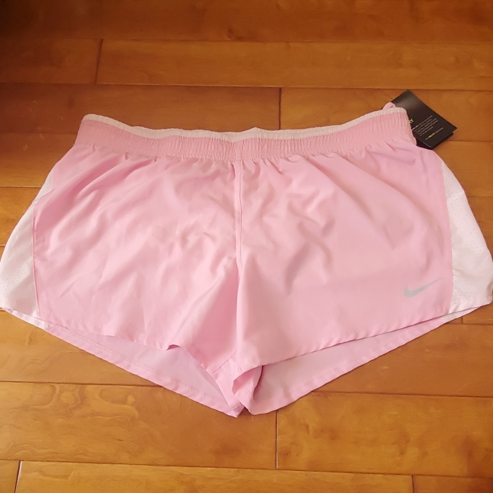 Nike dry fit running shorts it still has it tags